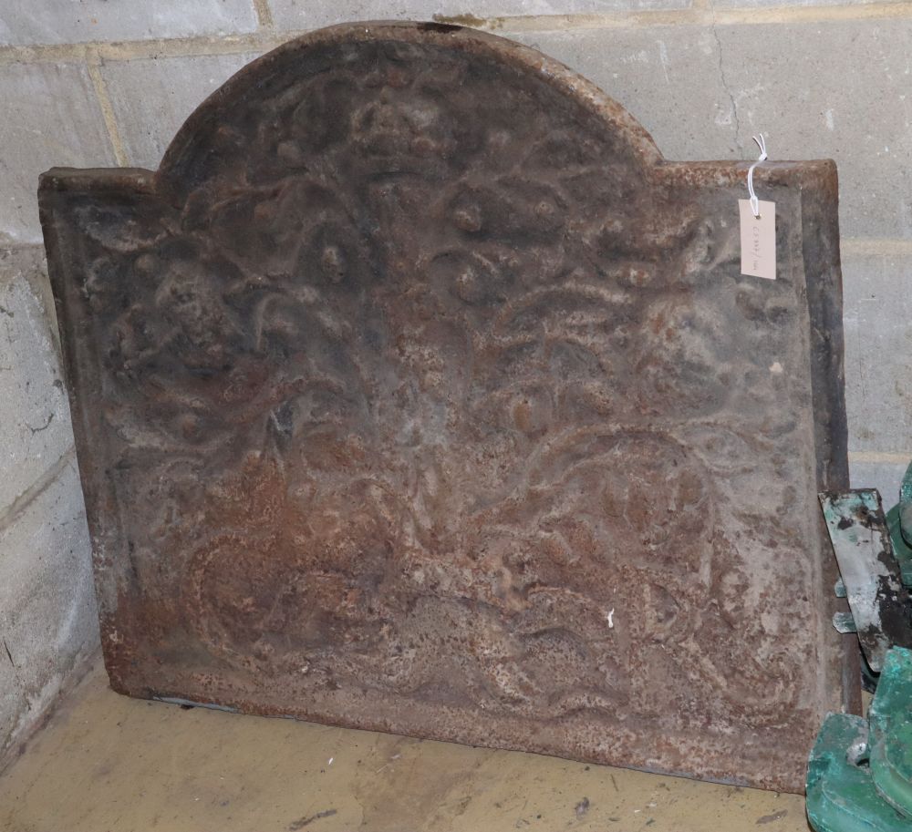 A Charles II cast iron fire back, W.87cm, H.72cm
